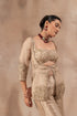 Beige gold silk bustier set with flare tissue flare panel pants and organza jacket